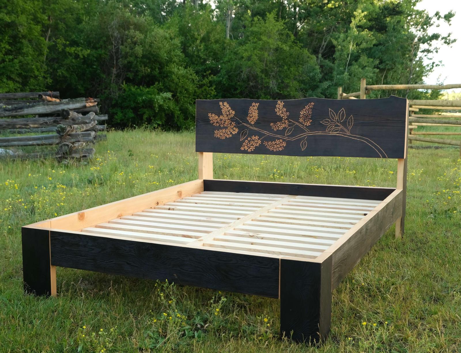 Lilac hand-carved floral fire-charred Douglas fir bed frame handcrafted in BC